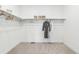 Spacious walk-in closet with ample hanging space and shelves for organized storage at 17125 W 92Nd Loop, Arvada, CO 80007