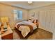 Cozy bedroom with double bed and large closet at 11604 Community Center Dr # 12, Northglenn, CO 80233