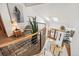 Elegant staircase with a view overlooking the open-concept floor plan below and skylights above at 3961 Mossy Rock Ln, Evergreen, CO 80439