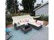 Inviting backyard with a comfortable sectional sofa, a table, and shade at 613 S Logan St, Denver, CO 80209