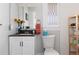 A clean bathroom with updated vanity and a shower/tub combo at 613 S Logan St, Denver, CO 80209