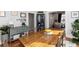Elegant dining room with hardwood floors, a classic table, and stylish decor at 613 S Logan St, Denver, CO 80209
