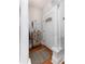 Bright entryway featuring a decorative accent table, white door with glass, and classic white columns at 613 S Logan St, Denver, CO 80209