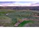 View of the community dog park area with grass and walking path at 5311 Blue Lunar Ln, Castle Rock, CO 80104
