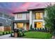 Modern home with manicured lawn, architectural details, and a stylish mailbox for curb appeal at 1518 S Columbine St, Denver, CO 80210