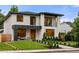 Stunning modern home with striking architectural details, professional landscaping, and inviting front entrance at 1518 S Columbine St, Denver, CO 80210