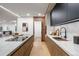 Modern kitchen showcasing a sleek island, custom cabinets, and high-end appliances perfect for culinary adventures at 1518 S Columbine St, Denver, CO 80210