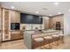 Gourmet kitchen featuring a large island, modern cabinetry, and stainless steel appliances for modern cooking at 1518 S Columbine St, Denver, CO 80210