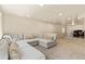 Finished basement boasting a large seating area at 6739 Blue Spruce St, Frederick, CO 80530