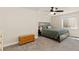 Comfortable bedroom with a ceiling fan, neutral walls, and plush carpeting at 6739 Blue Spruce St, Frederick, CO 80530