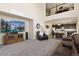Spacious living room with high ceilings, plush seating, and an open layout at 6739 Blue Spruce St, Frederick, CO 80530