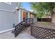 Backyard patio with steps and a wooden lattice fence at 3458 S Norfolk Way, Aurora, CO 80013