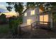 Backyard with a patio and stairs at sunset at 3458 S Norfolk Way, Aurora, CO 80013