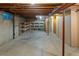 Unfinished basement with concrete floor and exposed ceiling at 3458 S Norfolk Way, Aurora, CO 80013