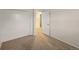 Bedroom with carpet, closet, and view to the next room at 3458 S Norfolk Way, Aurora, CO 80013