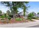 Beautiful exterior of home with lush lawn, showcasing attractive landscaping at 3458 S Norfolk Way, Aurora, CO 80013