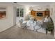 Cozy living room with a brick fireplace, sliding doors, and comfortable seating at 3458 S Norfolk Way, Aurora, CO 80013