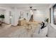 Open concept living area with easy access to stairs, kitchen and dining at 3458 S Norfolk Way, Aurora, CO 80013