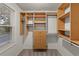 Spacious walk-in closet with shelving, drawers, and storage solutions for organization at 3458 S Norfolk Way, Aurora, CO 80013