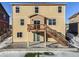 Elevated deck and patio with stairs leading to a fenced backyard at 6044 Point Rider Cir, Castle Rock, CO 80104
