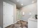 Bathroom with double vanity, shower, and tiled floors at 6044 Point Rider Cir, Castle Rock, CO 80104