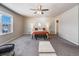 Bright and airy bedroom with neutral decor and carpeted floors at 6044 Point Rider Cir, Castle Rock, CO 80104