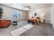 Spacious bedroom with carpeted floors and a ceiling fan at 6044 Point Rider Cir, Castle Rock, CO 80104