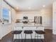 Modern kitchen with granite countertops and stainless steel appliances at 6044 Point Rider Cir, Castle Rock, CO 80104