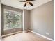 Bedroom featuring a window and ceiling fan at 625 Kendall Way, Lakewood, CO 80214
