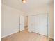Bedroom with hardwood floors and closet at 625 Kendall Way, Lakewood, CO 80214