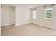 Spacious bedroom with ample natural light from large windows and neutral decor at 625 Kendall Way, Lakewood, CO 80214