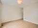 Empty bedroom with hardwood floors and overhead lighting at 625 Kendall Way, Lakewood, CO 80214