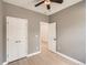 Bedroom featuring closet with sliding doors at 625 Kendall Way, Lakewood, CO 80214