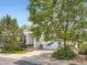 Charming home exterior with well-manicured landscaping and inviting entrance at 625 Kendall Way, Lakewood, CO 80214