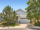 Charming single-Gathering home with a two-car garage, light-blue siding, and well-maintained landscaping at 625 Kendall Way, Lakewood, CO 80214