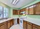 Bright kitchen with stainless steel dishwasher and range at 12025 Monaco Dr, Brighton, CO 80602