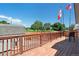 Back deck featuring wood floor, chairs and a view of the backyard and the neighborhood at 2800 Troxell Ave, Longmont, CO 80503