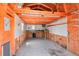 Inside of shed with storage and work areas with white and wood plank walls at 2800 Troxell Ave, Longmont, CO 80503