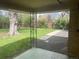 View of backyard from under covered patio at 799 N Holly St, Denver, CO 80220