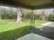 Covered patio with view of spacious backyard at 799 N Holly St, Denver, CO 80220