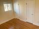 Bright bedroom with hardwood floors and ample closet space at 799 N Holly St, Denver, CO 80220