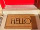 Front doormat with the word HELLO welcomes visitors at 799 N Holly St, Denver, CO 80220