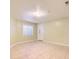Bright living room features neutral walls, tile floors, and a window for natural light at 9742 E Hawaii Pl, Aurora, CO 80247
