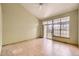 Bright main bedroom features vaulted ceilings, neutral walls, and ceramic tile flooring at 9742 E Hawaii Pl, Aurora, CO 80247