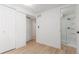 This bathroom has a glass shower, wood floors and fresh paint at 9120 Judson St, Westminster, CO 80031