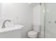 The bathroom has a glass shower stall and a modern sink at 9120 Judson St, Westminster, CO 80031