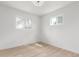 Sunny bedroom with lots of natural light and new floors at 9120 Judson St, Westminster, CO 80031