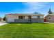 Charming single-story home with a well-maintained front yard and a light-colored exterior at 9120 Judson St, Westminster, CO 80031