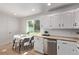 Charming eat in kitchen features stainless steel appliances and lots of natural light at 9120 Judson St, Westminster, CO 80031