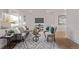 Bright living room with a large window, comfortable seating, and stylish decor, perfect for relaxation at 9120 Judson St, Westminster, CO 80031